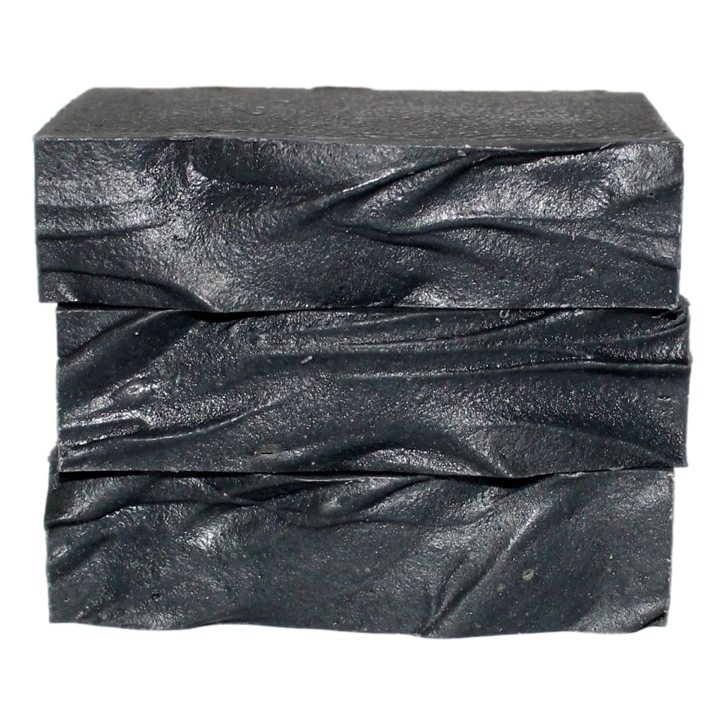 Stack of Black Willow Soap bars showing cross-section