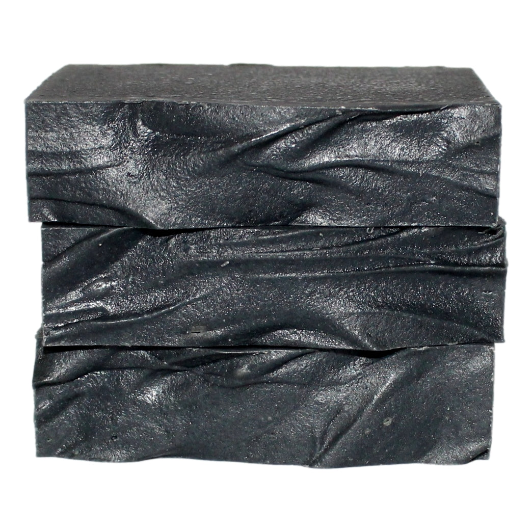 Stack of Black Willow Soap bars showing cross-section