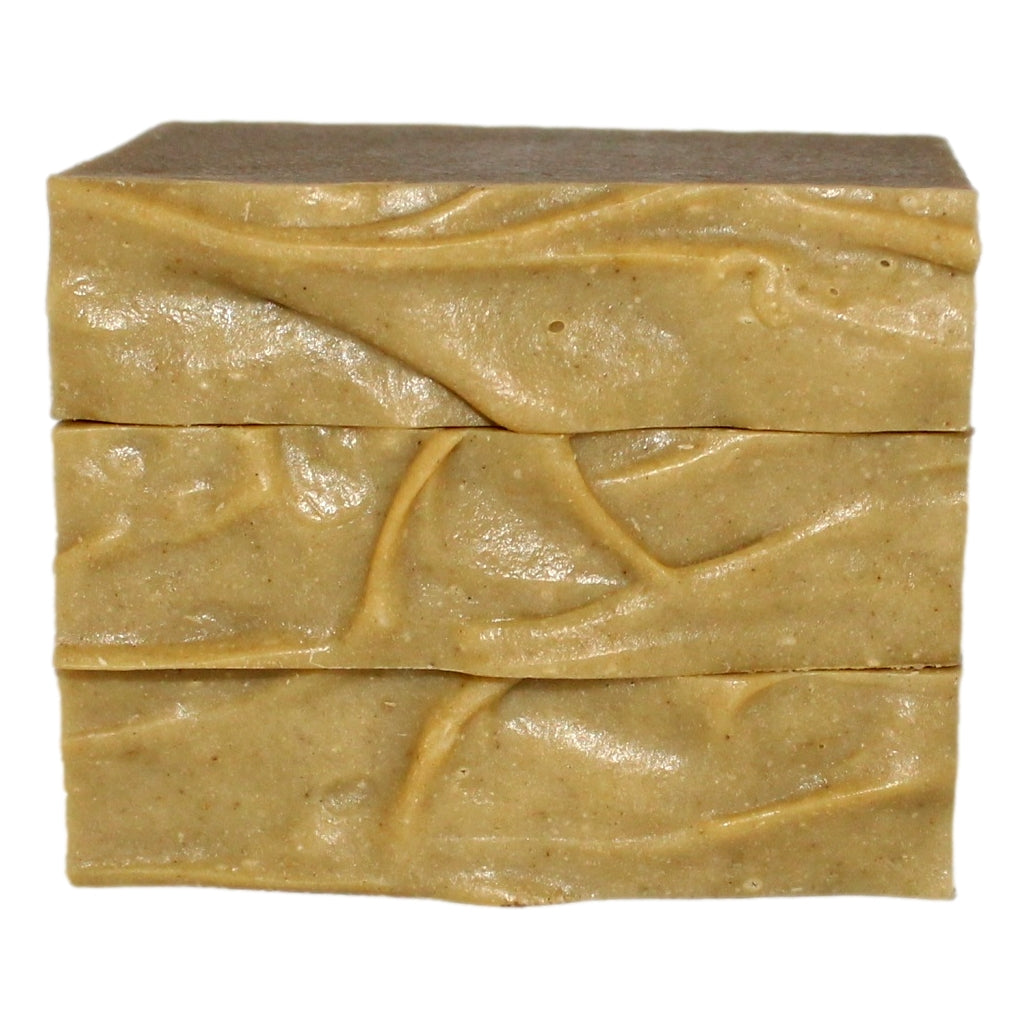 Stack of Dandelion Soap bars showing cross-section