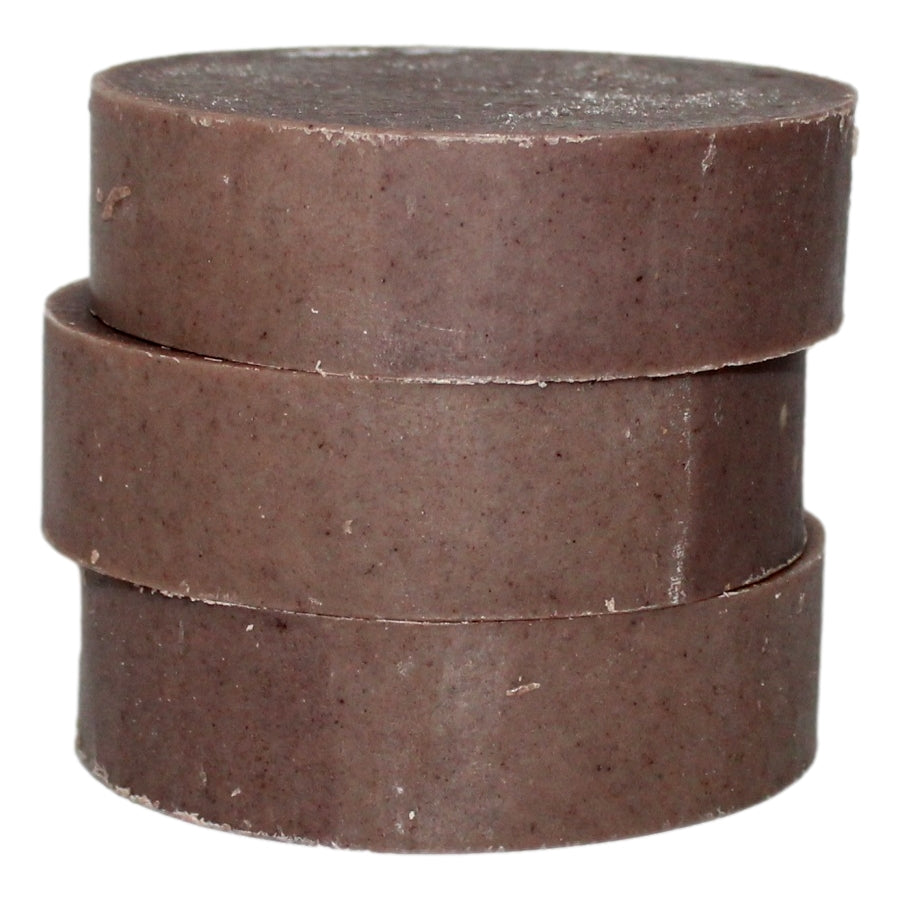 Stack of Sassafras Shave Soap bars showing cross-section