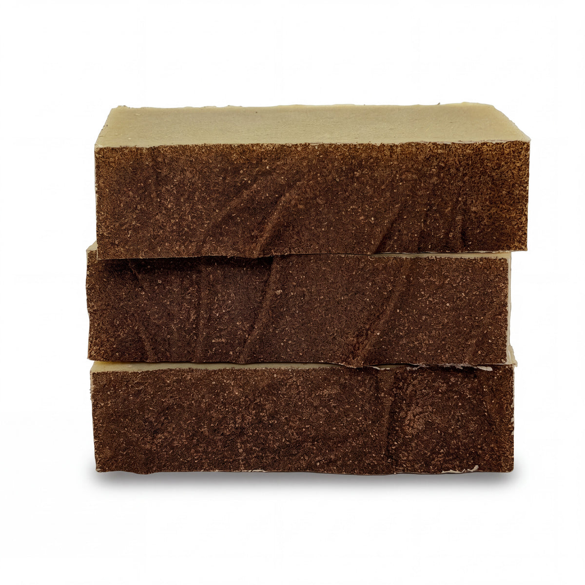 Stack of Warm Wishes Holiday Soap bars showing cross-section